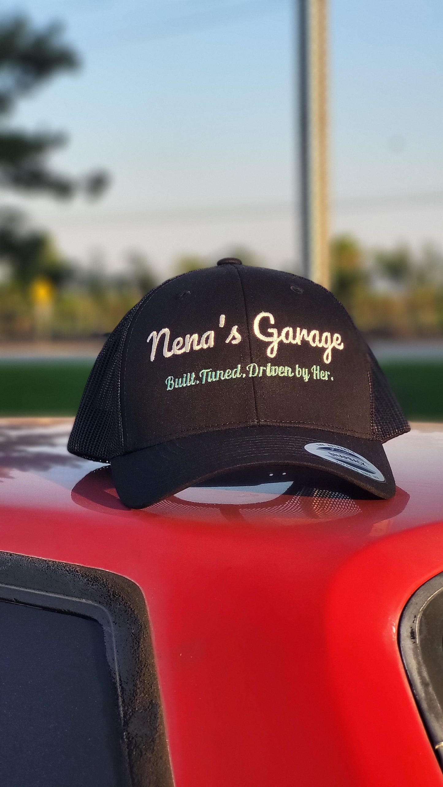 Nena's Garage Trucker Hat
